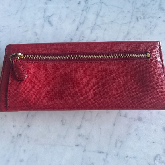 Prada Red Saffiano leather wallet with a bow accent. - Picture 3 of 5
